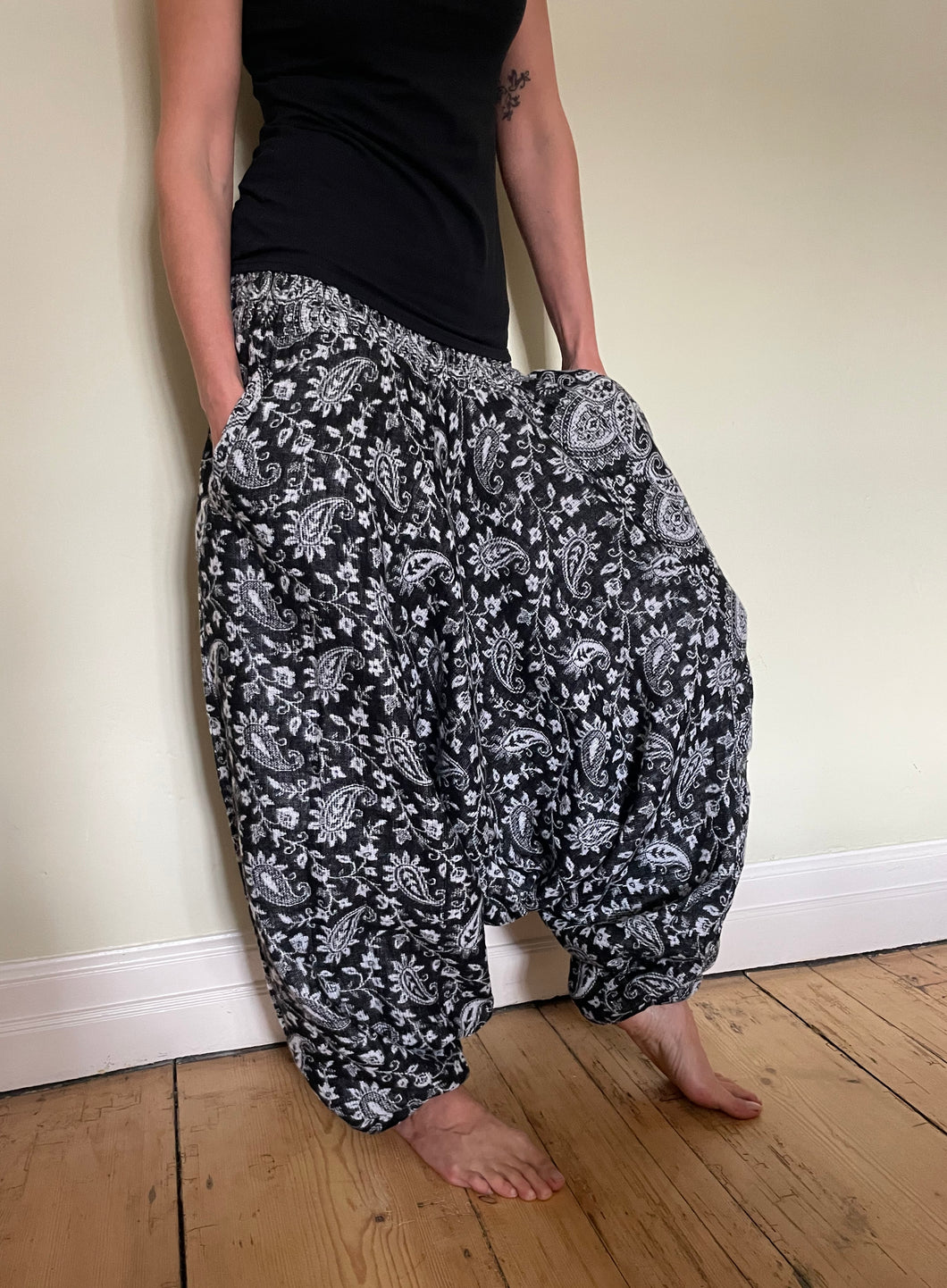 Emma's Emporium fleece genie harem trousers, loose fit warm winter  hippy pants, made from machine washable vegan fleece, in bright flower or paisley design. Slow fashion, ethically sourced hippie festival hippy fashion.