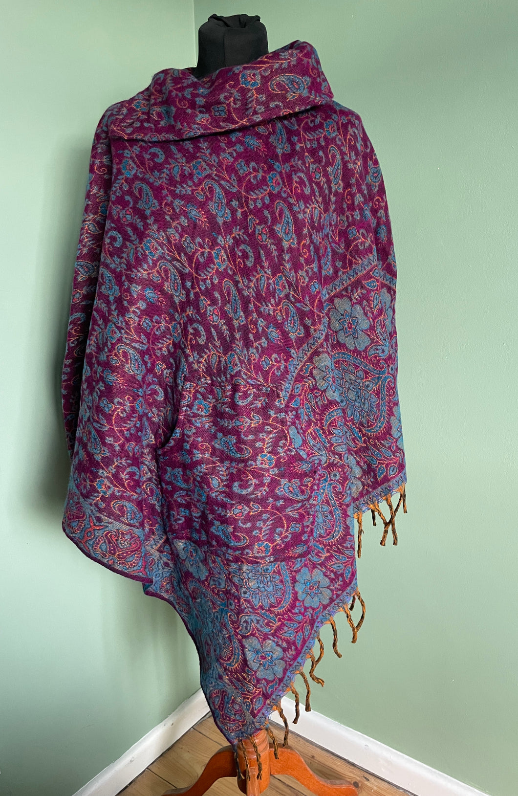 BUY NOW ONLINE! Emma's Emporium hooded fleece poncho, bold flower print, machine washable vegan fleece. Buy slow ethical women's hippy fashions online, wholesale and retail. Emma's Emporium, festival fashion from India, fair trade from around the world.